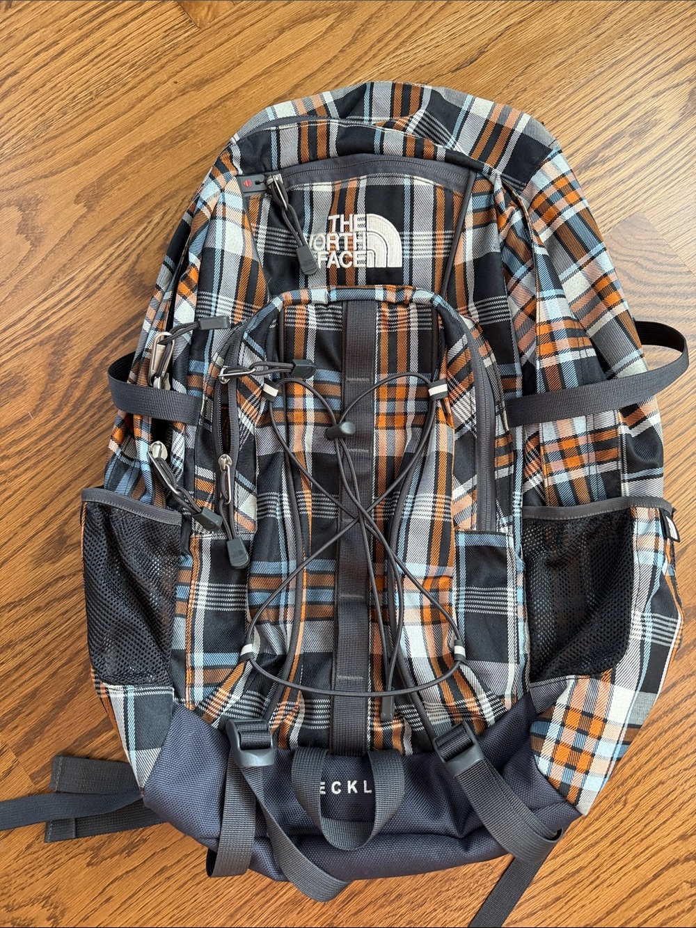 The North Face Plaid Backpack in Black, Orange & Gray